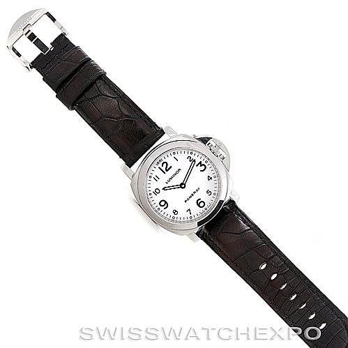 This image shows a top-down view of a Panerai Luminor PAM114 Men
s Stainless Steel White Dial PAM114 Men
s Stainless Steel White Dial watch with a white dial and a black leather strap.