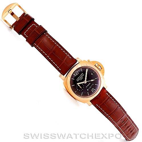 This image shows a full view of a Panerai Luminor PAM289 Men's Rose Gold Brown Dial PAM289 Men's Rose Gold Brown Dial watch, highlighting the brown leather strap, black dial, and gold-tone case, taken from above.