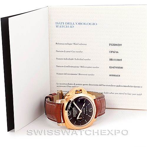 The Panerai Luminor PAM289 Men's Rose Gold Brown Dial PAM289 Men's Rose Gold Brown Dial watch is shown at an angle displaying the face, crown, and leather strap, alongside its open watch booklet.