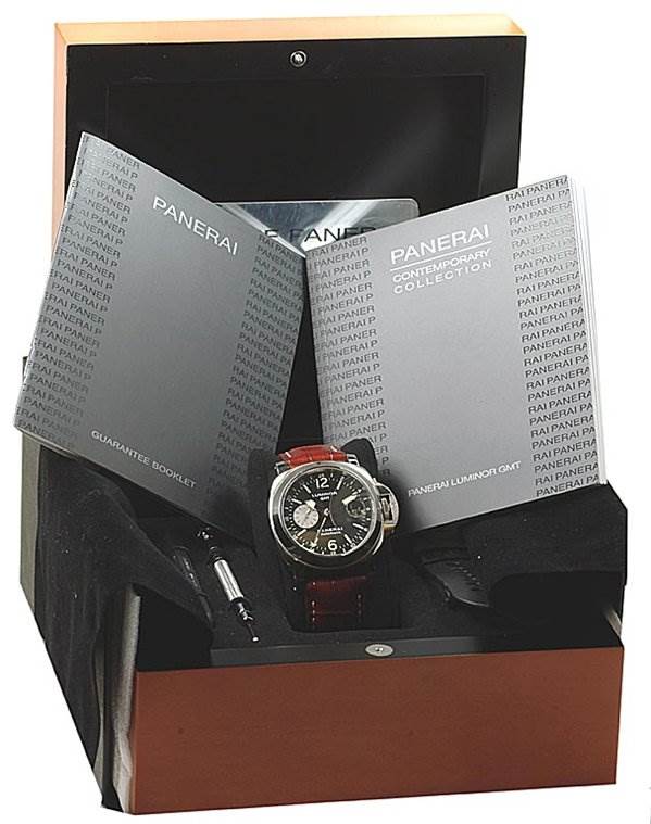 The image shows a Panerai Luminor PAM88 Men's Stainless Steel Black Dial PAM88 Men's Stainless Steel Black Dial model watch in its box, accompanied by booklets and a tool.