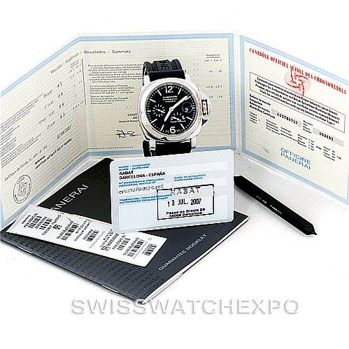 The image shows the Panerai Luminor PAM00090 Men's Stainless Steel Black Dial PAM00090 Men's Stainless Steel Black Dial watch placed with its accompanying documentation and accessories, including warranty cards and a strap-changing tool.