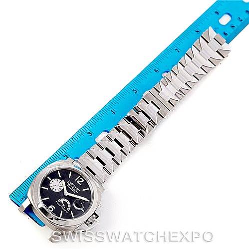 The image shows a Panerai Luminor PAM00171 Men's Titanium Black Dial PAM00171 Men's Titanium Black Dial watch with a stainless steel band viewed from a top angle alongside a ruler.