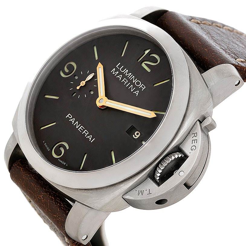 This image shows a close-up, angled view of the Panerai Luminor PAM00351 Men's Titanium Brown Dial PAM00351 Men's Titanium Brown Dial watch face, brown leather strap, crown guard, and casing.