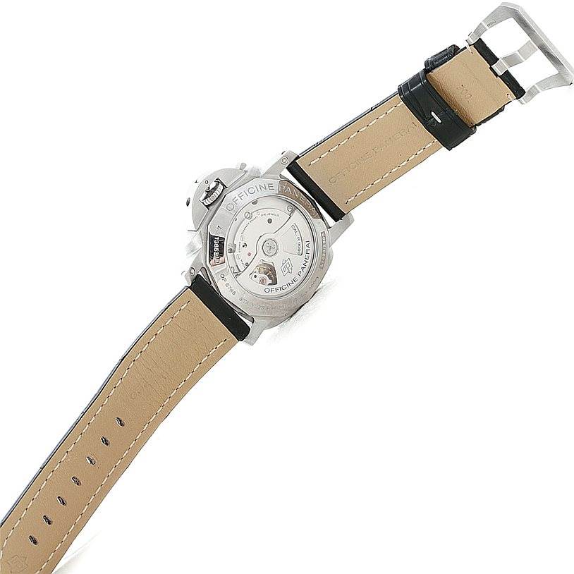 The image shows the back of a Panerai Luminor PAM00312 Men's Stainless Steel Black Dial PAM00312 Men's Stainless Steel Black Dial watch with its movement and leather strap visible.