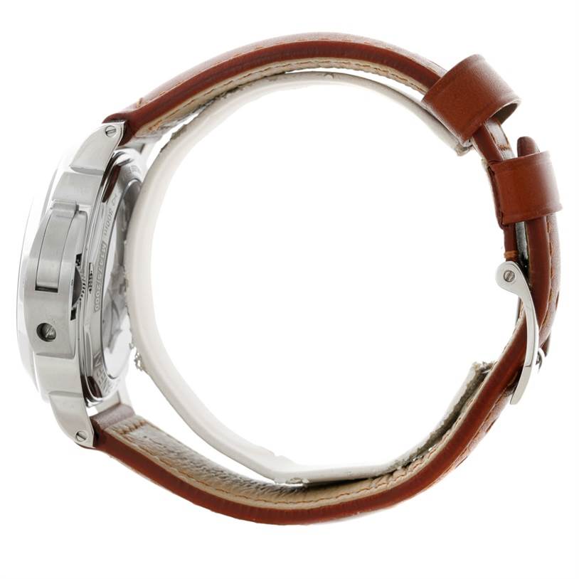 The image shows a side view of a Panerai Luminor PAM00112 Men
s Stainless Steel Black Dial PAM00112 Men
s Stainless Steel Black Dial watch, highlighting the case, crown, and brown leather strap.
