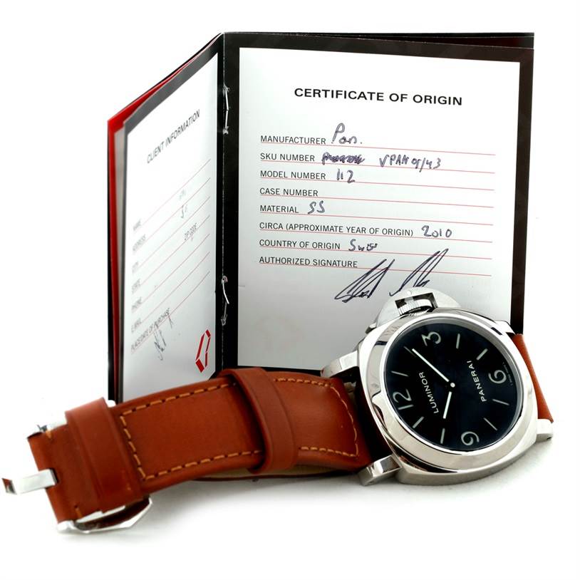 The image shows a Panerai Luminor PAM00112 Men
s Stainless Steel Black Dial PAM00112 Men
s Stainless Steel Black Dial watch laid flat with its leather strap and a certificate of origin behind it.