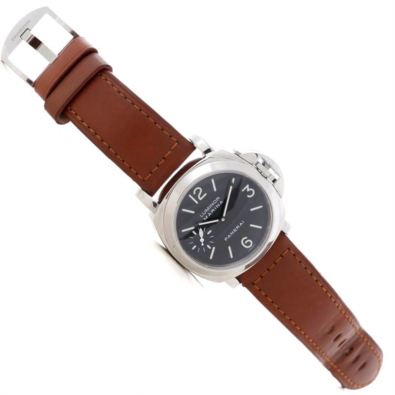 The image shows a Panerai Luminor PAM00111 Men's Stainless Steel Black Dial PAM00111 Men's Stainless Steel Black Dial watch from a top-down angle, displaying the face, crown guard, and brown leather strap.