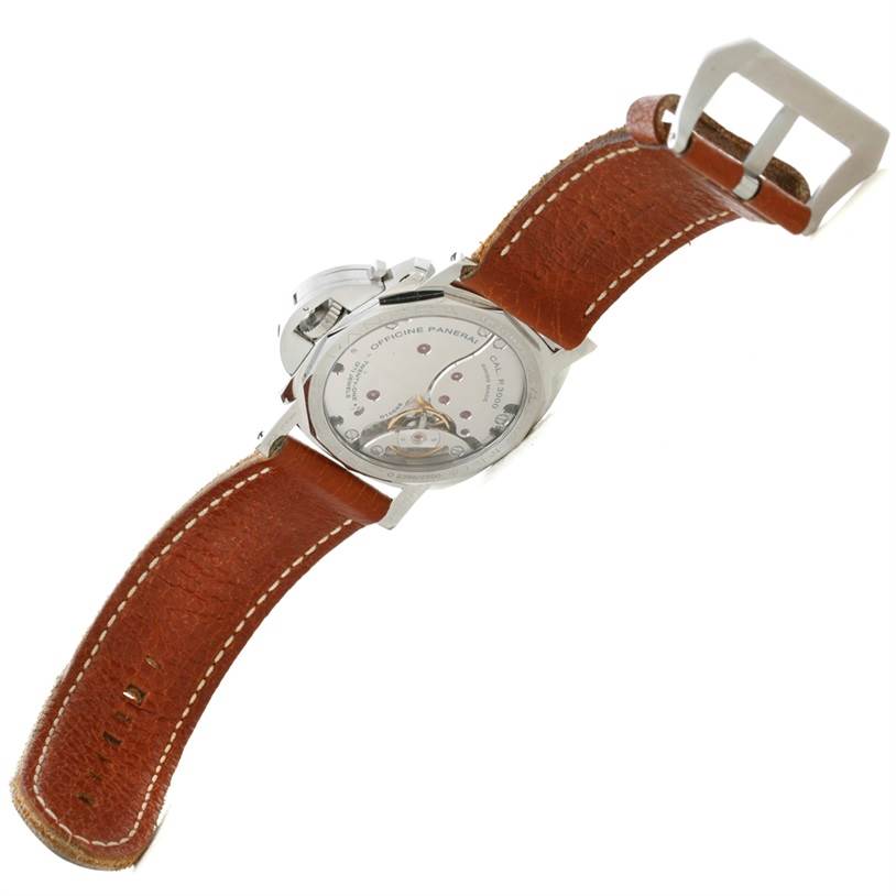 The image shows the back side of a Panerai Luminor PAM00372 Men
s Stainless Steel Black Dial PAM00372 Men
s Stainless Steel Black Dial watch, displaying the movement through the transparent case back and brown leather strap.