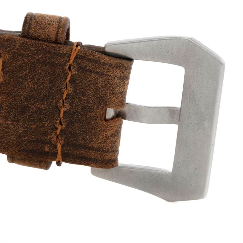 This image shows a close-up of the brown leather strap and silver buckle of a Panerai Luminor PAM00359 Men's Stainless Steel Black Dial PAM00359 Men's Stainless Steel Black Dial watch.