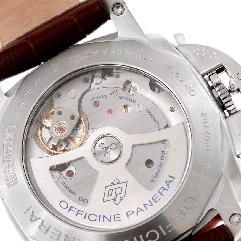 The image shows the open back of a Panerai Luminor PAM00312 Men's Stainless Steel Black Dial PAM00312 Men's Stainless Steel Black Dial watch, revealing the intricate movement and inner mechanisms.