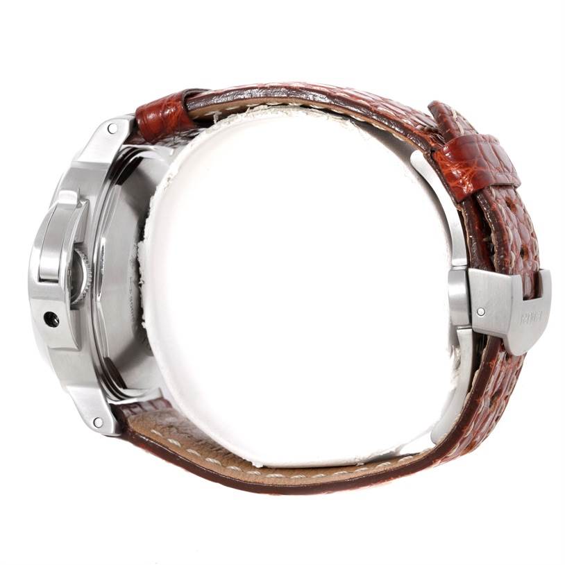 This image shows a side view of a Panerai Luminor PAM00048 Men's Stainless Steel Black Dial PAM00048 Men's Stainless Steel Black Dial watch, highlighting its crown guard and brown leather strap.