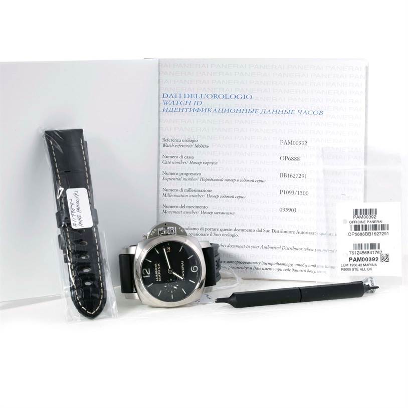 This image shows a Panerai Luminor PAM00392 Men's Stainless Steel Black Dial PAM00392 Men's Stainless Steel Black Dial watch, an extra strap, a tool, and documentation, all from a front angle.