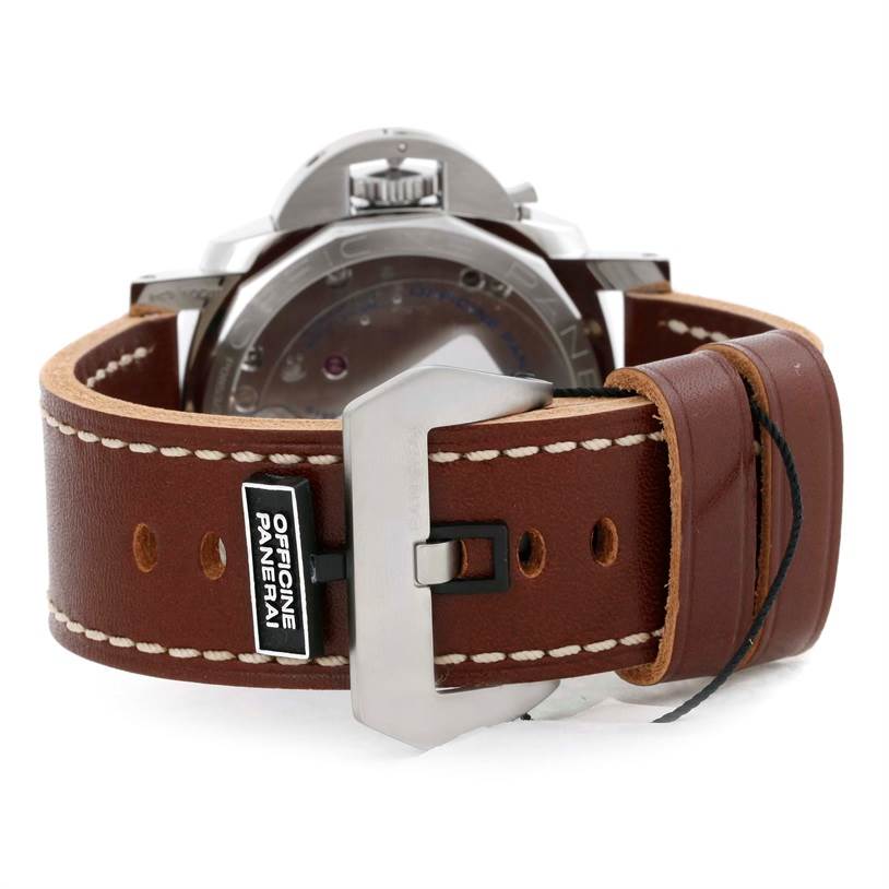 The image shows the back view of a Luminor model by Panerai, highlighting the brown leather strap and clasp.