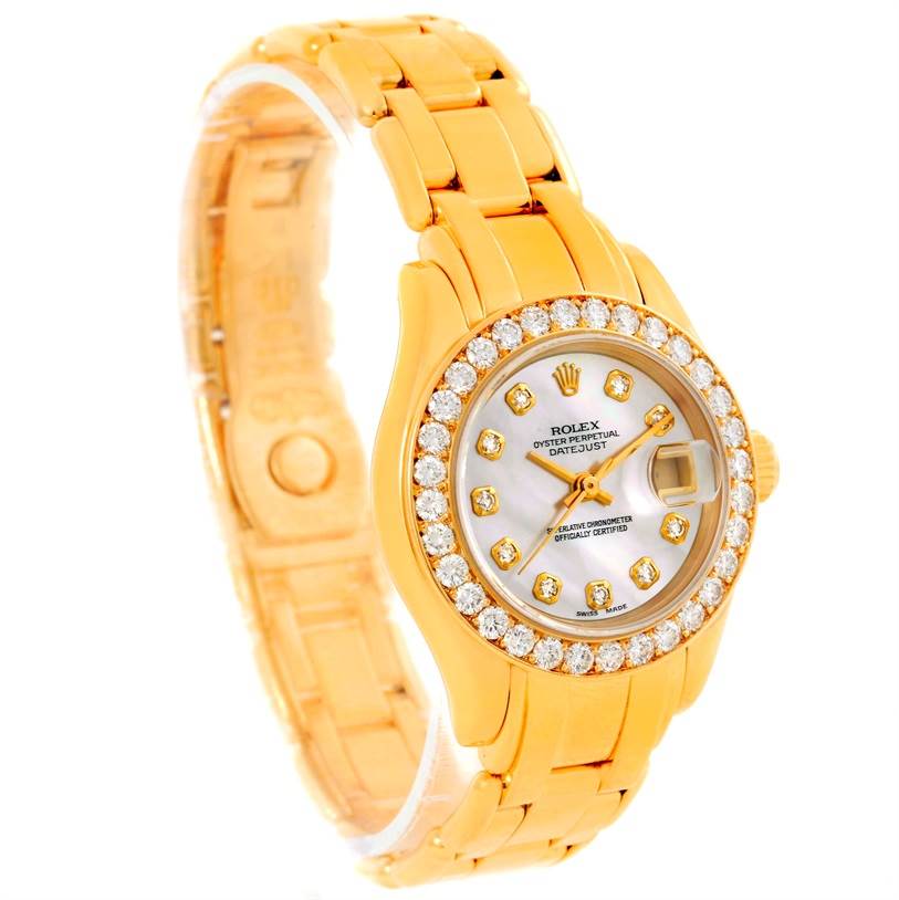 The image shows a Rolex Pearlmaster 69298 Women's Yellow Gold Mother of Pearl Dial 69298 Women's Yellow Gold Mother of Pearl Dial watch at an angled view highlighting its gold band, diamond bezel, and detailed dial.