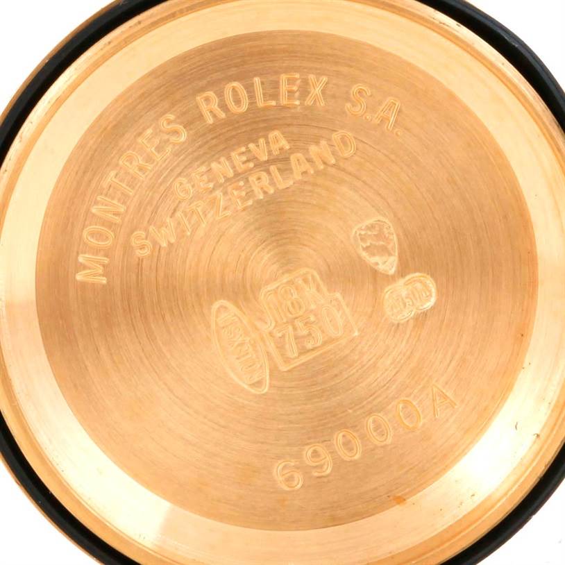 This is the interior view of a Rolex Pearlmaster 69298 Women's Yellow Gold Mother of Pearl Dial 69298 Women's Yellow Gold Mother of Pearl Dial watch case back with engravings.