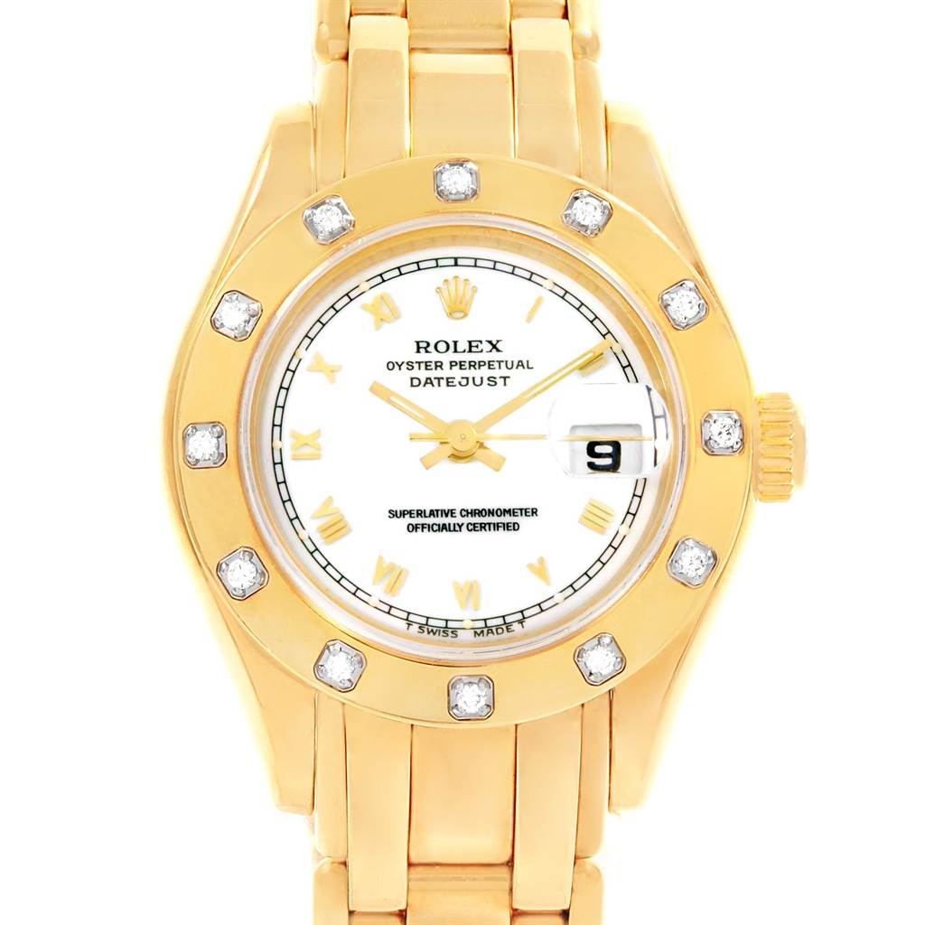 The image shows a front view of a gold Rolex Pearlmaster 69318 Women's Yellow Gold White Dial 69318 Women's Yellow Gold White Dial Datejust watch, highlighting the dial, bezel, and bracelet.