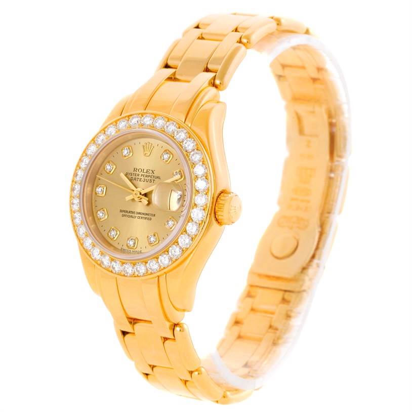 This image shows a Rolex Pearlmaster 69298 Women's Yellow Gold Champagne Dial 69298 Women's Yellow Gold Champagne Dial watch at an angle highlighting its gold bracelet, diamond-studded bezel, and crown.