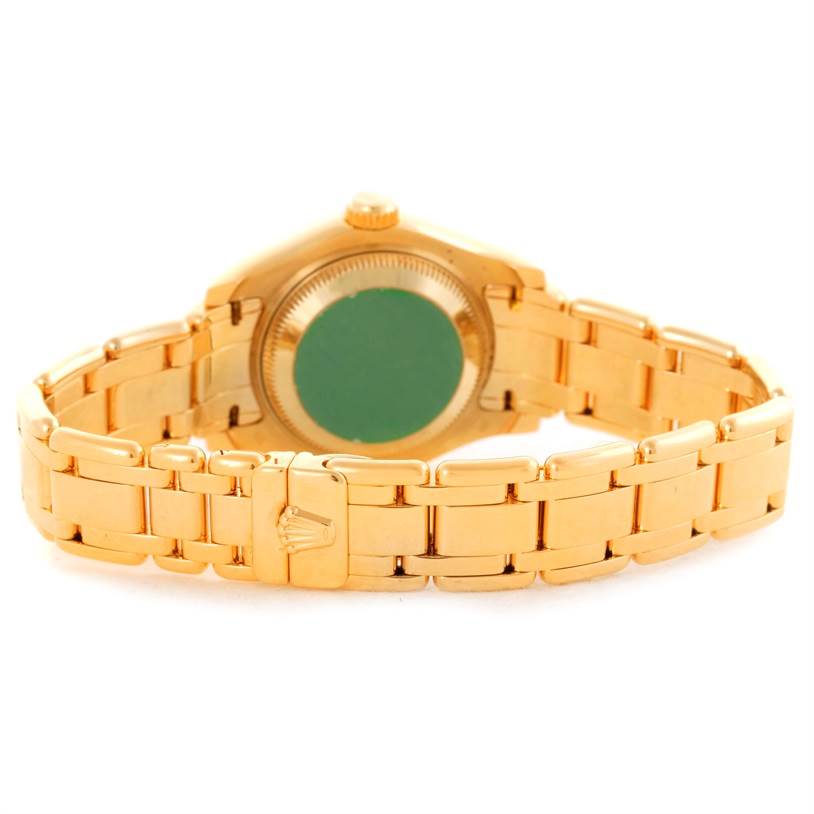 The image shows the back and bracelet of a Rolex Pearlmaster 69298 Women's Yellow Gold Champagne Dial 69298 Women's Yellow Gold Champagne Dial watch, displaying the clasp and case back.