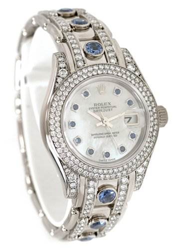 This image shows a Rolex Pearlmaster 80359 Women's White Gold Mother of Pearl Dial 80359 Women's White Gold Mother of Pearl Dial watch from a front angle, highlighting the diamond-encrusted bezel and gem-accented bracelet.