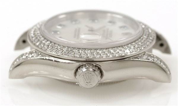 The image shows a side view of the Rolex Pearlmaster 80359 Women's White Gold Mother of Pearl Dial 80359 Women's White Gold Mother of Pearl Dial watch, highlighting its diamond-encrusted bezel and the crown.