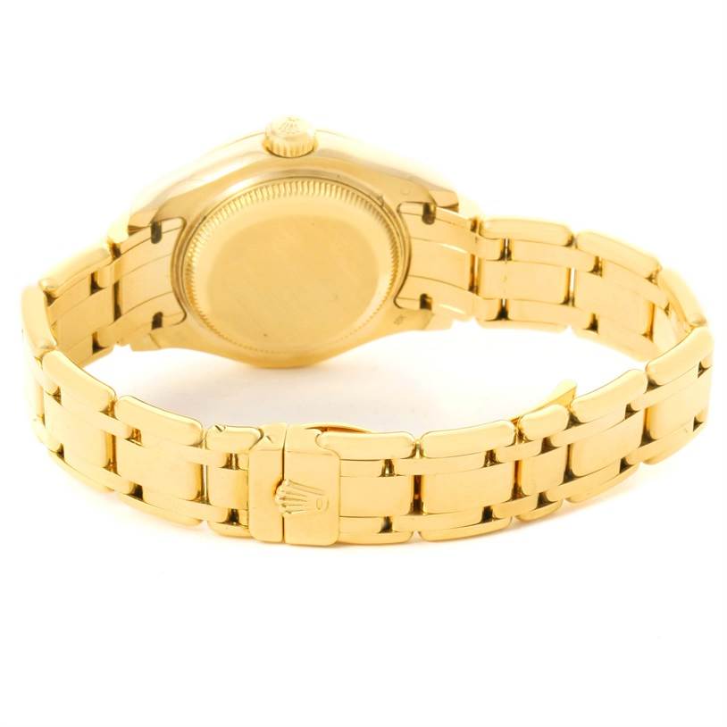 This image shows the back case and bracelet of a Rolex Pearlmaster 80298 Women's Yellow Gold Champagne Dial 80298 Women's Yellow Gold Champagne Dial watch, focusing on the clasp and links from a rear angle.