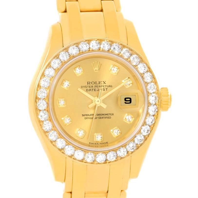 This image shows a frontal view of a Rolex Pearlmaster 80298 Women's Yellow Gold Champagne Dial 80298 Women's Yellow Gold Champagne Dial watch with its dial, bezel, and part of its bracelet visible.