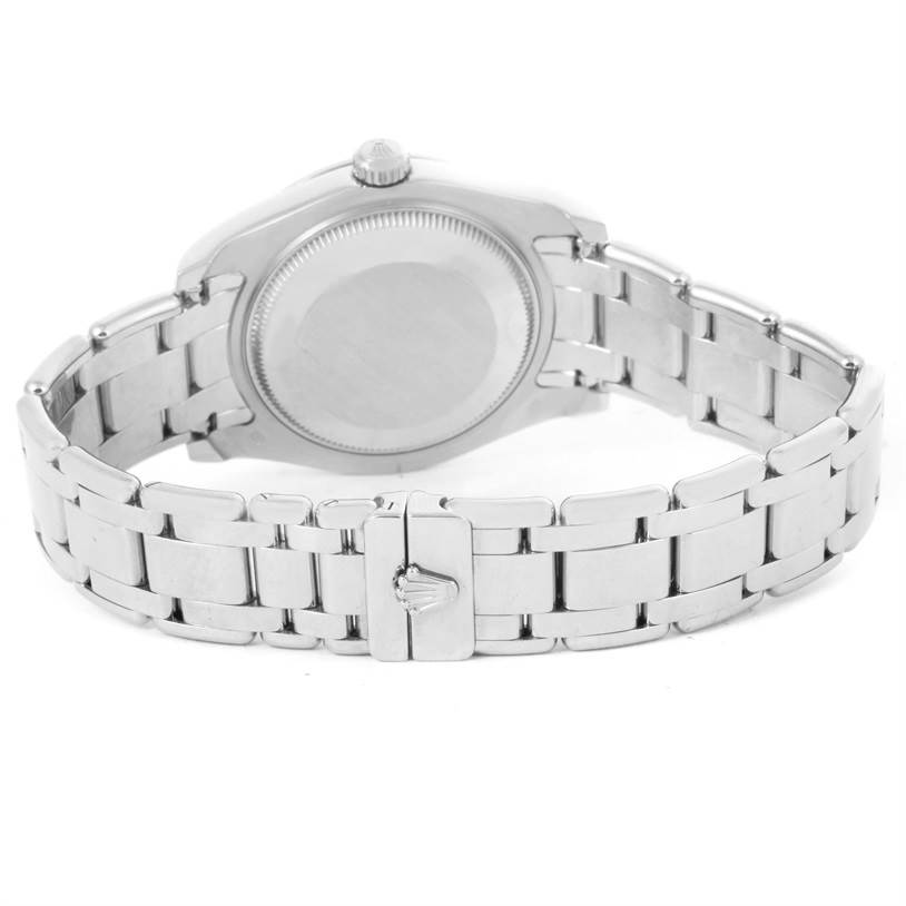 The image shows the back view of the Rolex Pearlmaster 81209 Women's White Gold White Dial 81209 Women's White Gold White Dial watch, highlighting its bracelet and clasp.