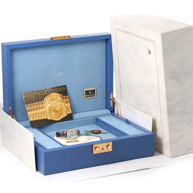 The image shows a Rolex Pearlmaster 80299 Women's White Gold Mother of Pearl Dial 80299 Women's White Gold Mother of Pearl Dial watch and its accessories inside an open jewelry box, including documentation and tags.