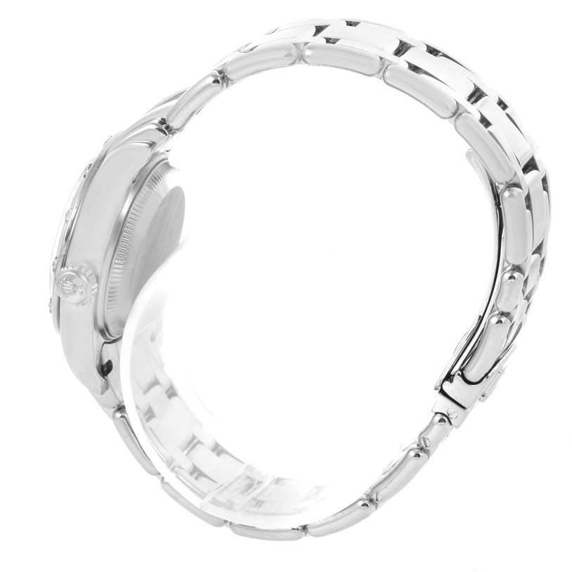 This image shows a side profile of the Rolex Pearlmaster 80319 Women's White Gold White Dial 80319 Women's White Gold White Dial watch, highlighting its case, crown, and bracelet.
