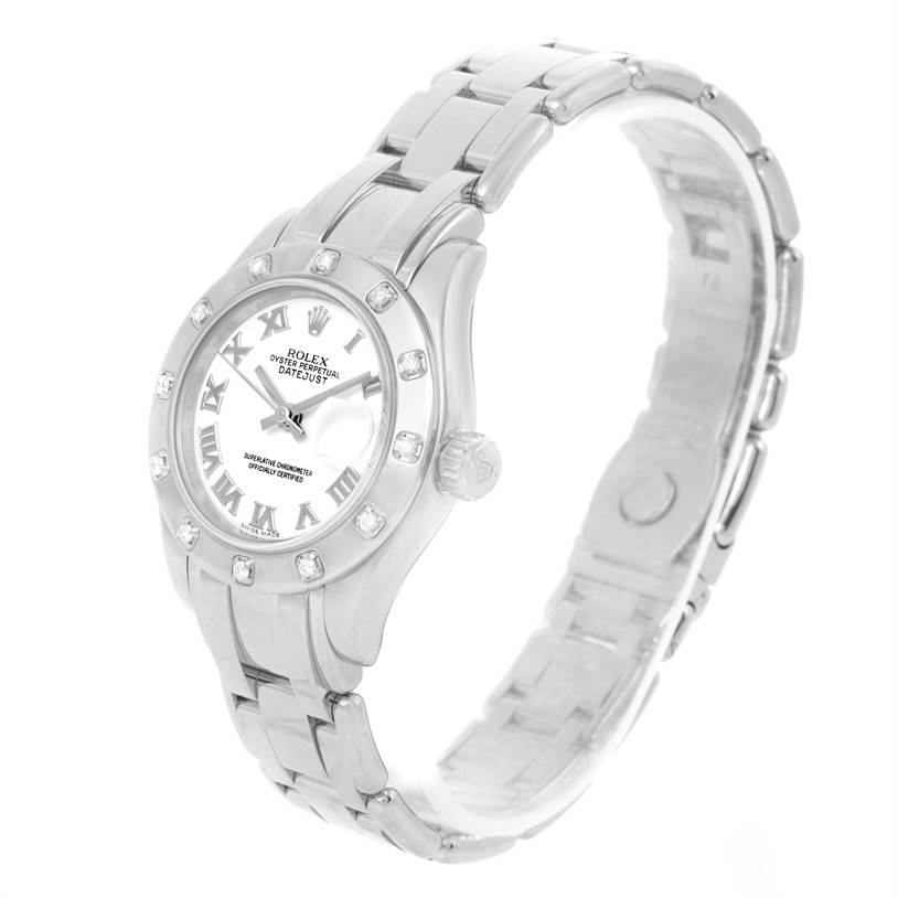 The Rolex Pearlmaster 80319 Women's White Gold White Dial 80319 Women's White Gold White Dial watch is shown at an angled view, focusing on its face, bezel, and bracelet.