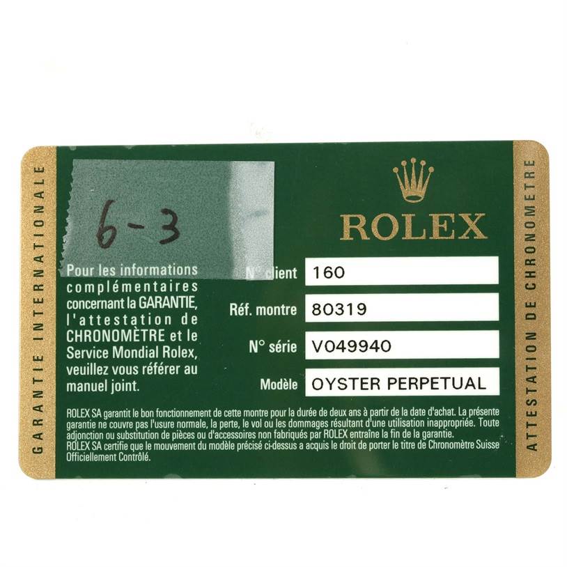 This is an image of a Rolex warranty card for the Pearlmaster model, shown from a top-down angle.