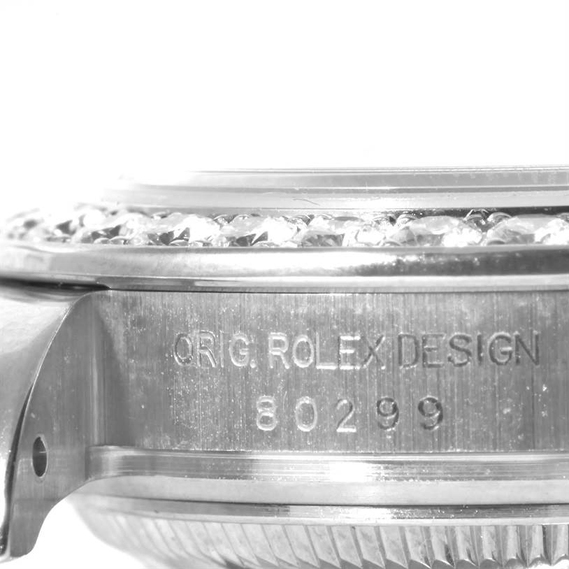 This image shows a close-up side view of the casing and bezel of the Rolex Pearlmaster 80299 Women's White Gold Mother of Pearl Dial 80299 Women's White Gold Mother of Pearl Dial watch, with the model number 80299 engraved on it.