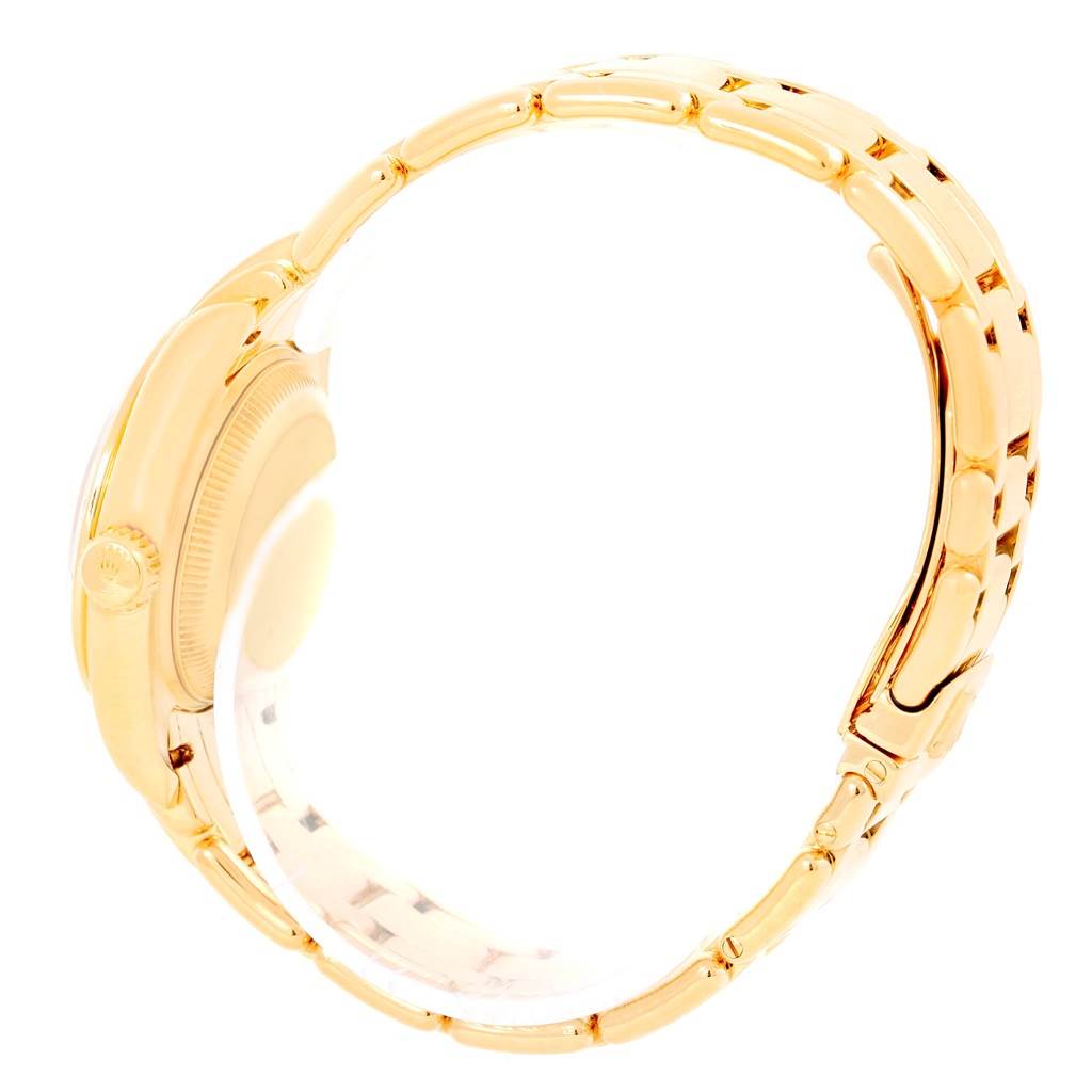 The image shows a side view of a Rolex Pearlmaster 69298 Women's Yellow Gold Mother of Pearl Dial 69298 Women's Yellow Gold Mother of Pearl Dial watch highlighting the crown and part of the bracelet.