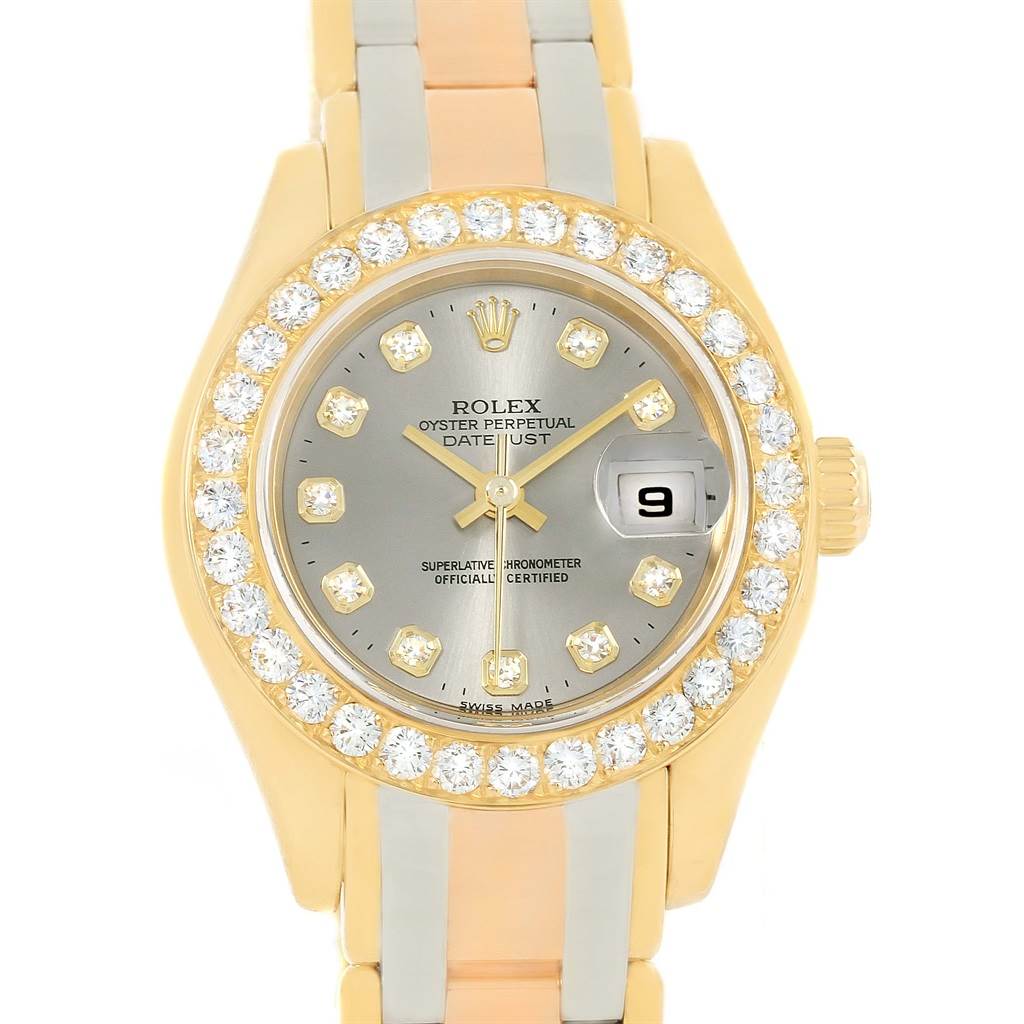 The image shows a front view of a Rolex Pearlmaster 80298 Women's Yellow Gold Silver Dial 80298 Women's Yellow Gold Silver Dial watch, highlighting its diamond-encrusted bezel and gold bracelet.