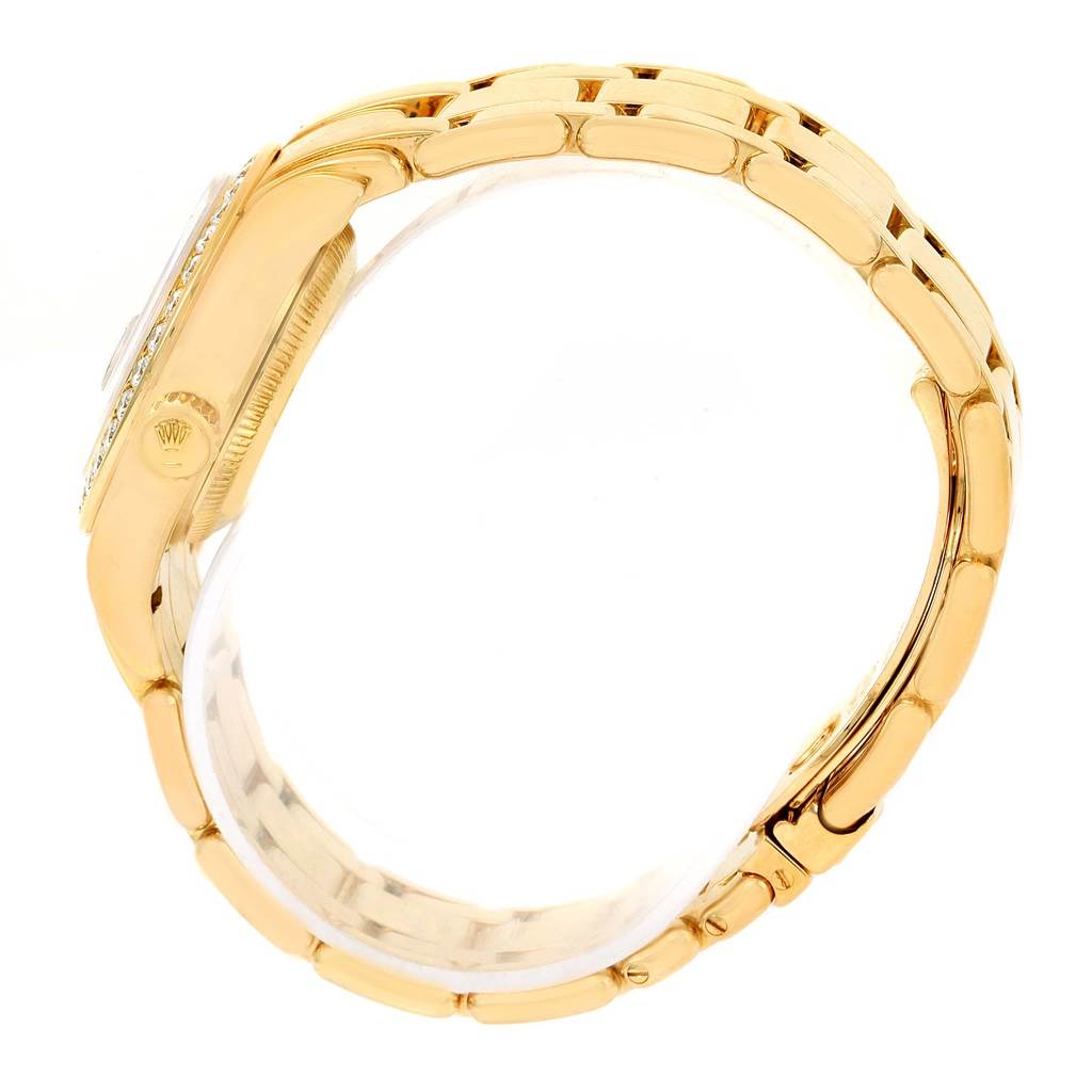 This image shows a side profile of a Rolex Pearlmaster 69298 Women's Yellow Gold Silver Dial 69298 Women's Yellow Gold Silver Dial watch, highlighting the bracelet and crown.