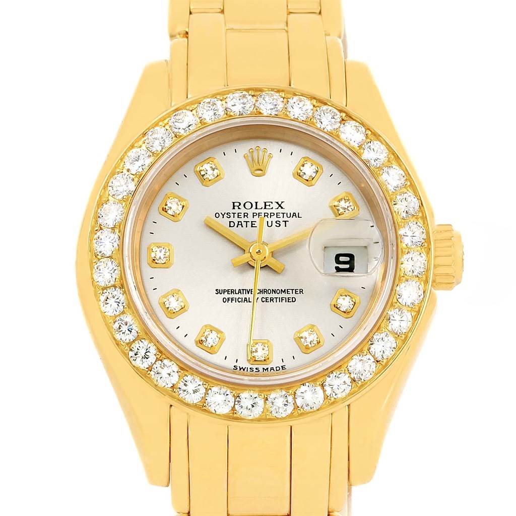 The image shows a front view of the Rolex Pearlmaster 69298 Women's Yellow Gold Silver Dial 69298 Women's Yellow Gold Silver Dial watch, highlighting the dial, bezel, and part of the bracelet.