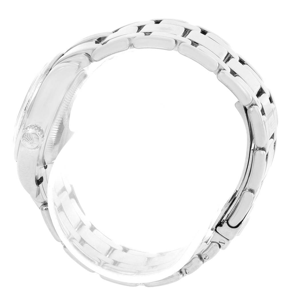 This image of a Rolex Pearlmaster 69298 Women's White Gold Mother of Pearl Dial 69298 Women's White Gold Mother of Pearl Dial watch shows a side view of the case and part of the bracelet.