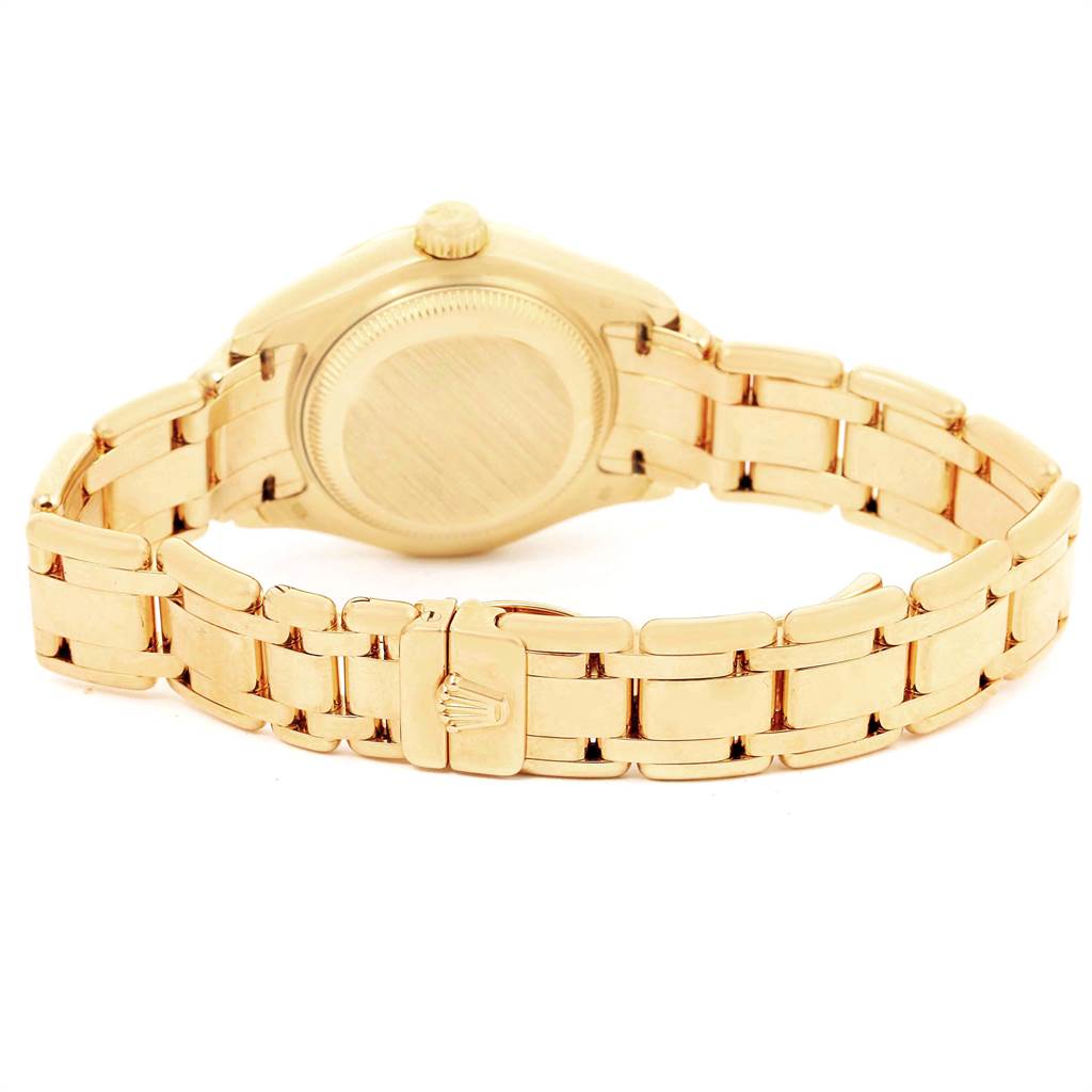 This image shows the back view of a Rolex Pearlmaster 69298 Women's Yellow Gold Mother of Pearl Dial 69298 Women's Yellow Gold Mother of Pearl Dial watch, highlighting its gold bracelet and clasp.