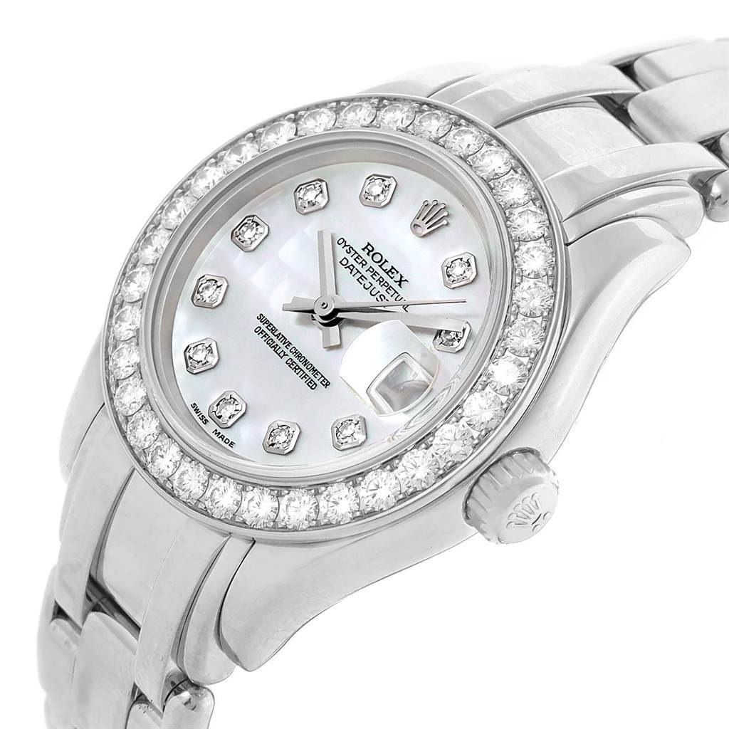The image shows a Rolex Pearlmaster 80299 Women
s White Gold Mother of Pearl Dial 80299 Women
s White Gold Mother of Pearl Dial watch angled from the front, highlighting its diamond-encrusted bezel, dial, and part of the bracelet.
