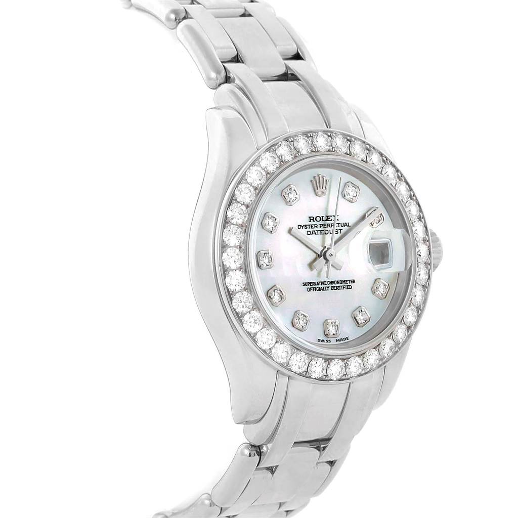 The Rolex Pearlmaster 80299 Women
s White Gold Mother of Pearl Dial 80299 Women
s White Gold Mother of Pearl Dial watch is shown at an angle emphasizing the face, bezel, and part of the bracelet.