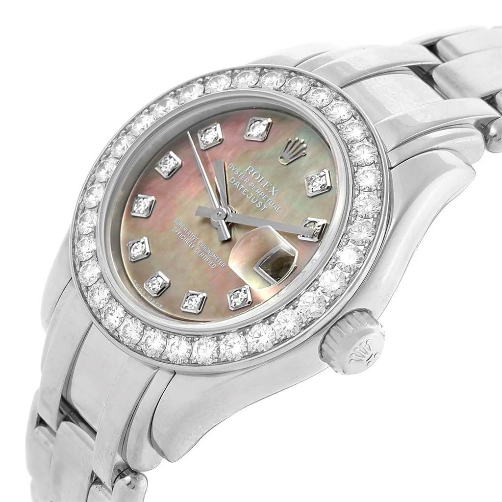 This image shows a close-up angle of a Rolex Pearlmaster 80299 Women
s White Gold Mother of Pearl Dial 80299 Women
s White Gold Mother of Pearl Dial watch, highlighting its diamond bezel, dial, and bracelet.