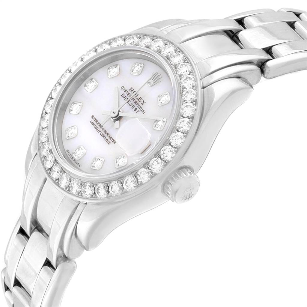 This Rolex Pearlmaster 80299 Women's White Gold Mother of Pearl Dial 80299 Women's White Gold Mother of Pearl Dial watch is shown at an angle, displaying the face, bezel, crown, and part of the bracelet.