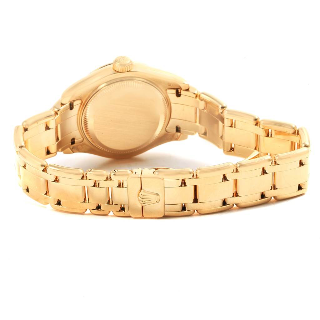 The image shows the back view of the Rolex Pearlmaster 80318 Men's Yellow Gold Mother of Pearl Dial 80318 Men's Yellow Gold Mother of Pearl Dial watch, highlighting the case back, crown, and the bracelet with the clasp.