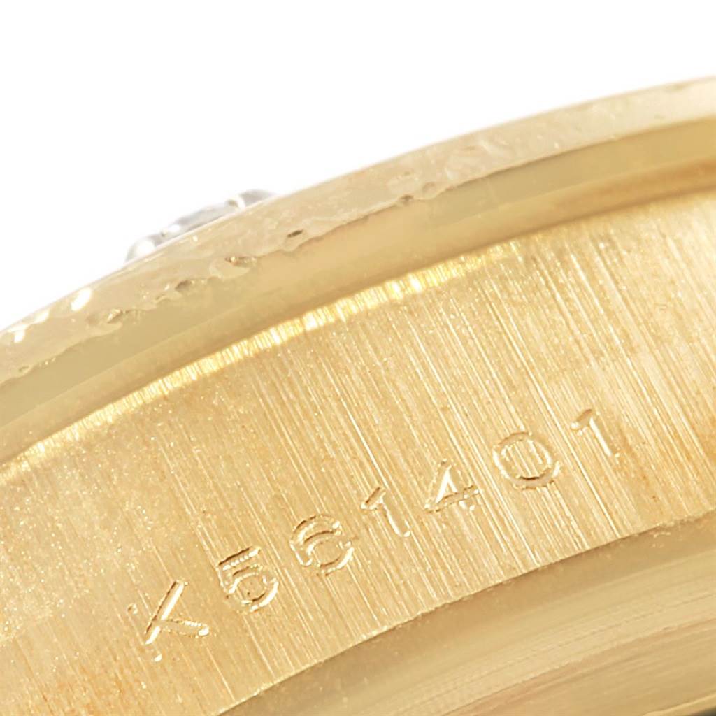 The image shows a close-up of the serial number engraving on the edge of a Rolex Pearlmaster 80318 Men's Yellow Gold Mother of Pearl Dial 80318 Men's Yellow Gold Mother of Pearl Dial watch.