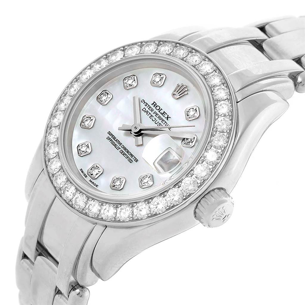 The image shows a close-up of the face and part of the bracelet of a Rolex Pearlmaster 80299 Women's White Gold Mother of Pearl Dial 80299 Women's White Gold Mother of Pearl Dial watch, highlighting the bezel, crown, and dial.