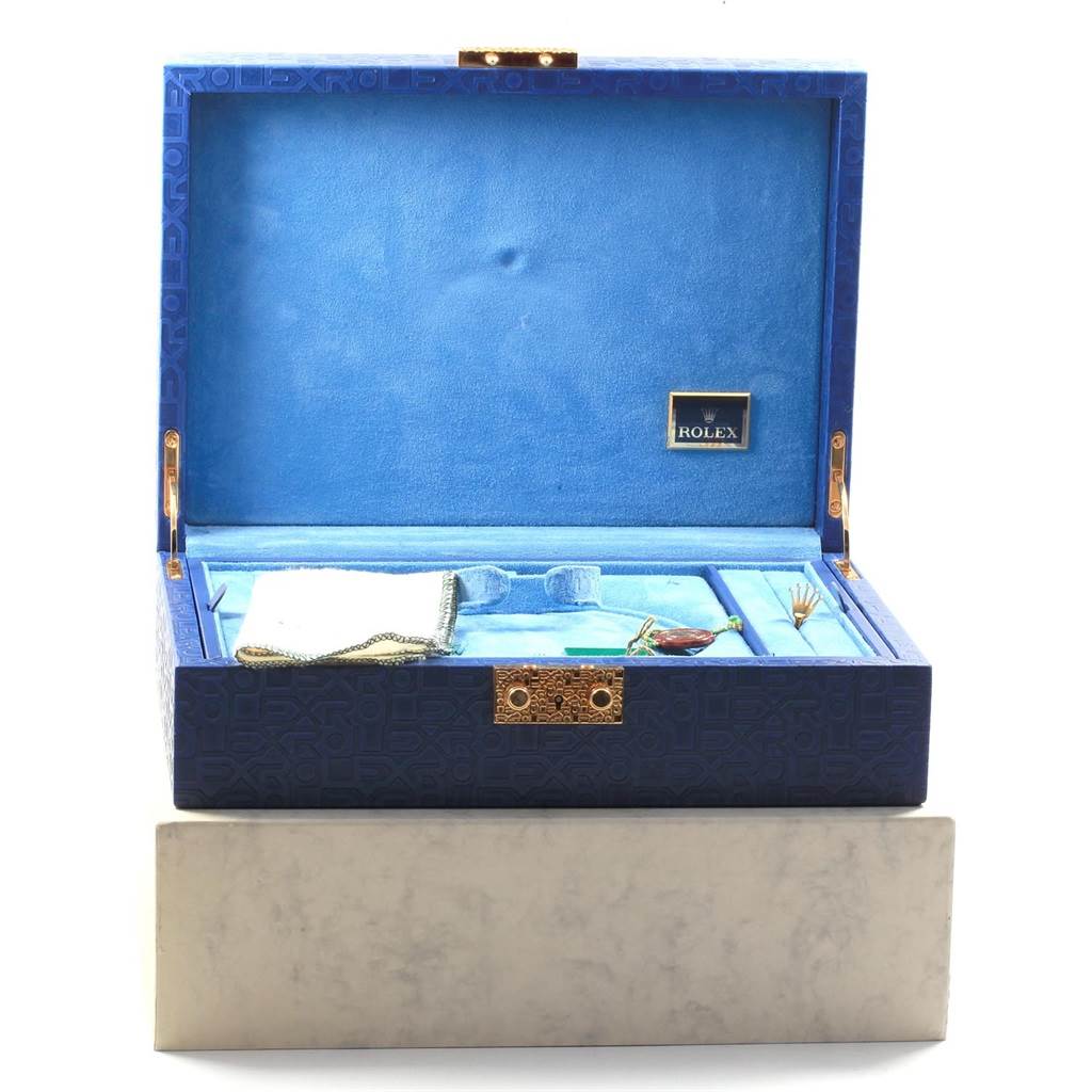 The image shows an open Rolex jewelry box for the Pearlmaster model, with compartments and accessories inside.