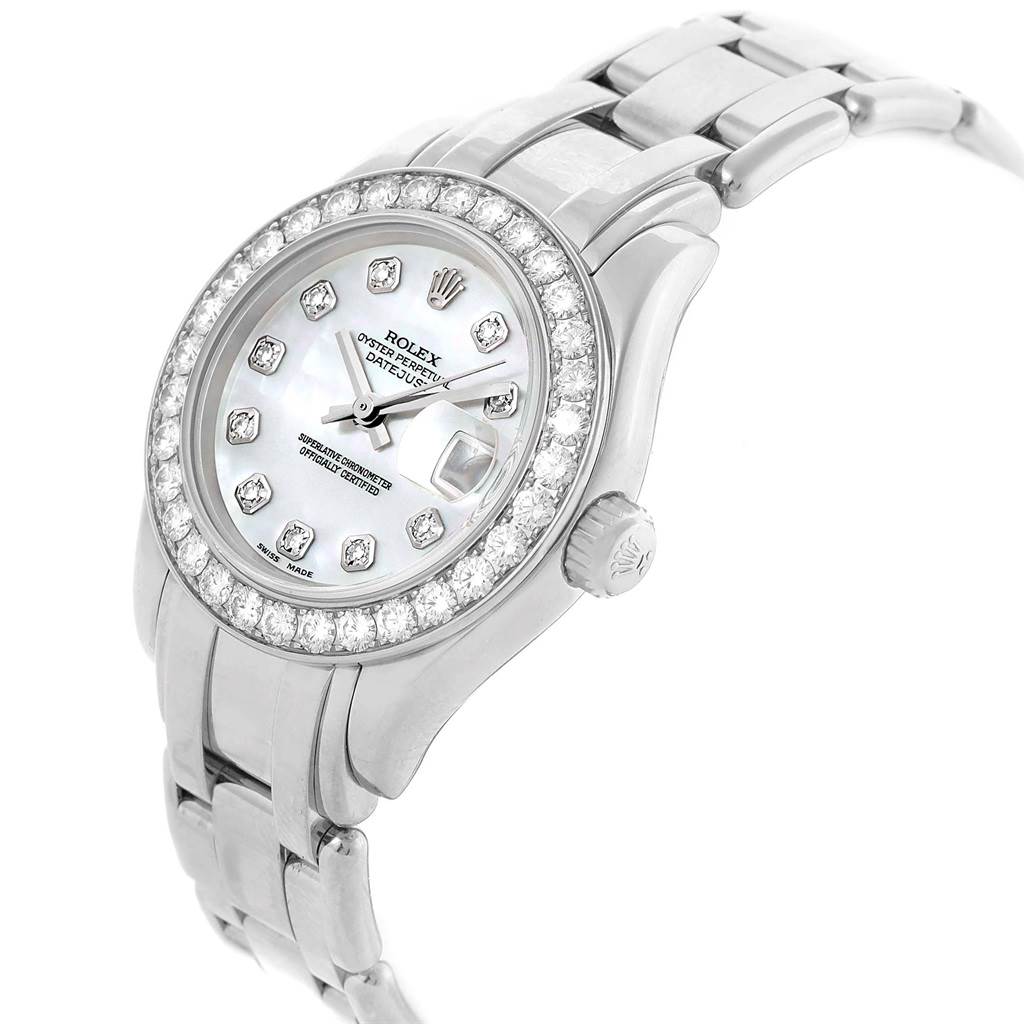 The image shows an angled view of a Rolex Pearlmaster 80299 Women's White Gold Mother of Pearl Dial 80299 Women's White Gold Mother of Pearl Dial, displaying its diamond-encrusted bezel, dial, and part of the bracelet.