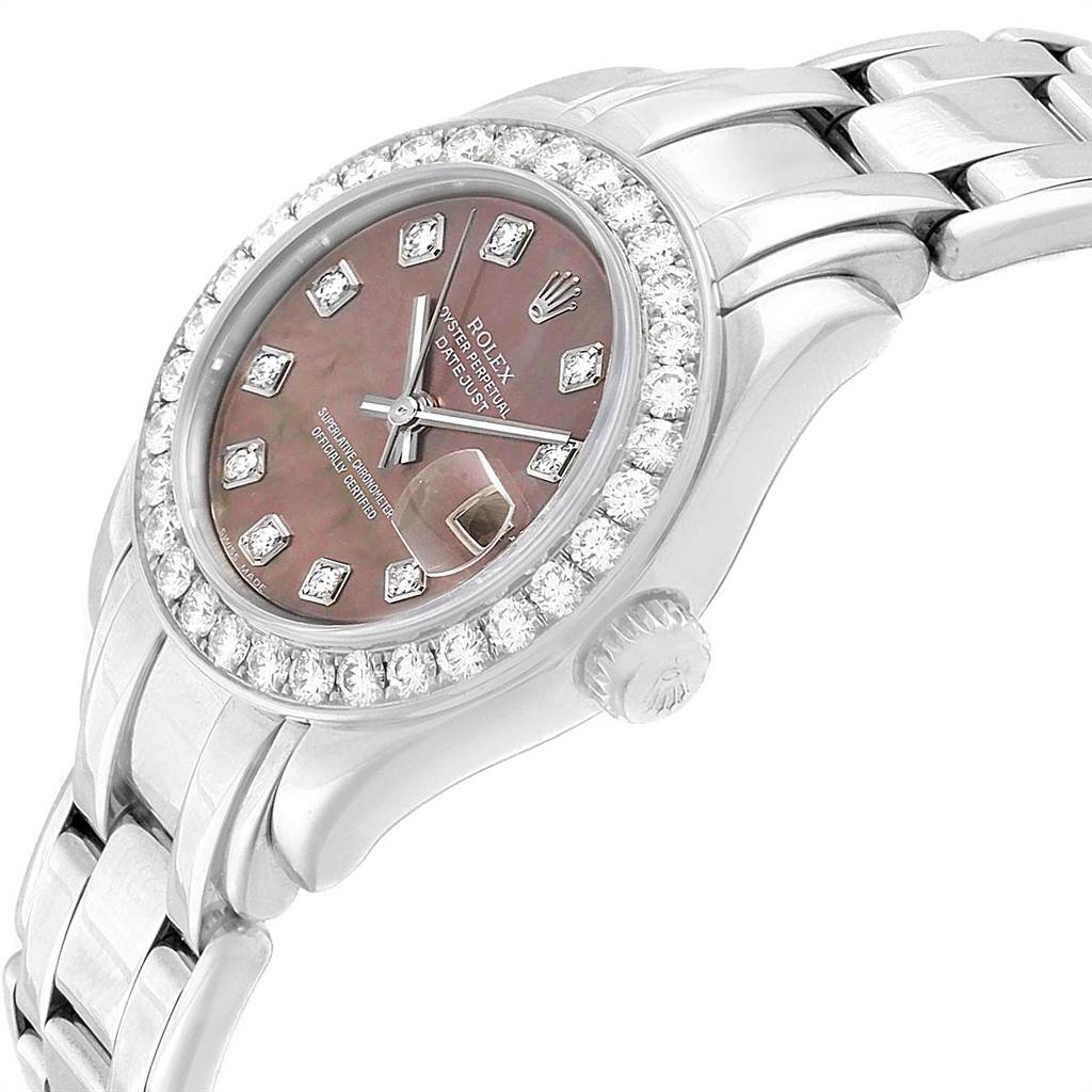 This image shows a Rolex Pearlmaster 80299 Women
s White Gold Mother of Pearl Dial 80299 Women
s White Gold Mother of Pearl Dial watch from an angled side view, highlighting its face, bezel, crown, and part of the bracelet.