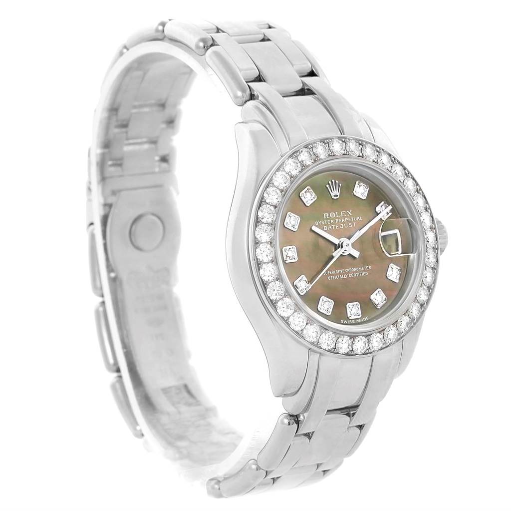 The image shows a side angle view of a Rolex Pearlmaster 80299 Women's White Gold Mother of Pearl Dial 80299 Women's White Gold Mother of Pearl Dial watch, highlighting its face, bezel, and metal bracelet.