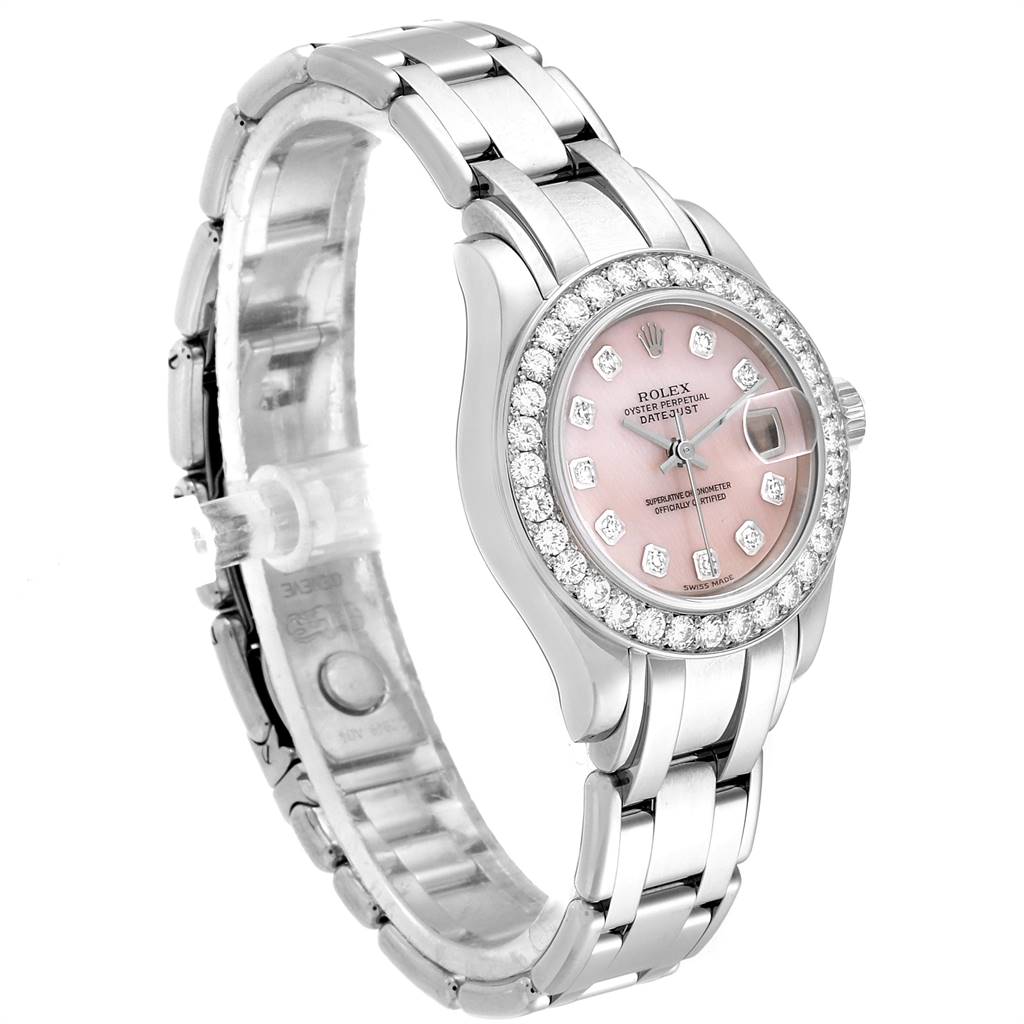 This image shows a Rolex Pearlmaster 80299 Women's White Gold Mother of Pearl Dial 80299 Women's White Gold Mother of Pearl Dial watch at an angled view, highlighting its pink dial, diamond bezel, and silver bracelet.